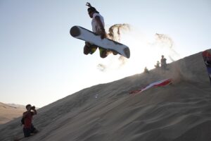 Sandboarding in the Sahara Desert